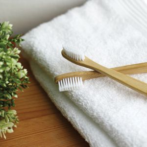 bambooth toothbrushes shown on towel