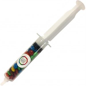 clear plastic syringe filled with colourful mini M&Ms