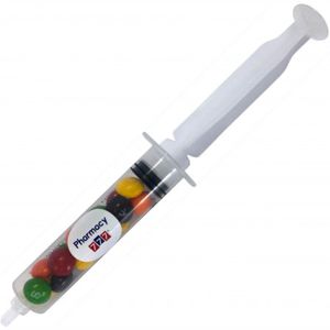 plastic syringe filled with Skittles